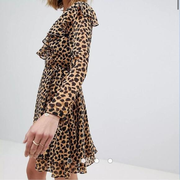 Free People Leopard Print Frenchie Mini
Wrap Dress Size Large lightweight - Picture 2 of 13
